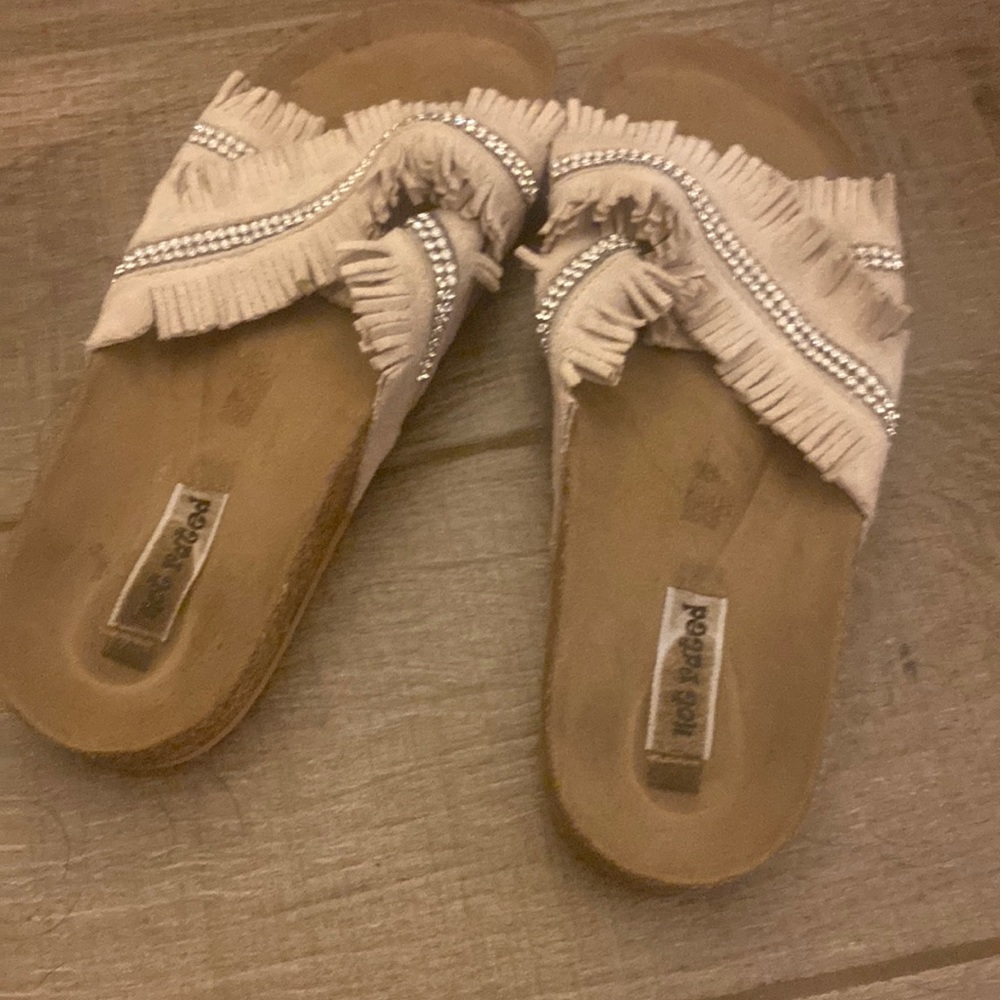 Cream fringe and rhinestone shoes